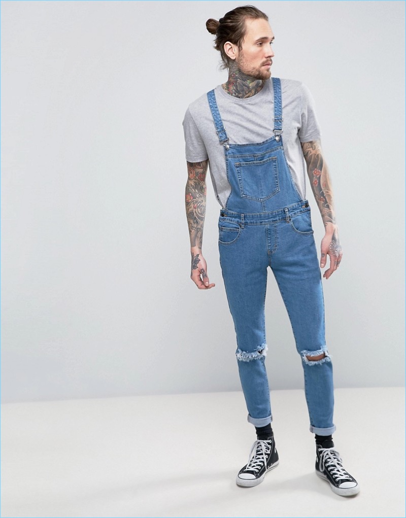 Always Rare's denim overalls provide a slim-fit and trendy ripped knees.