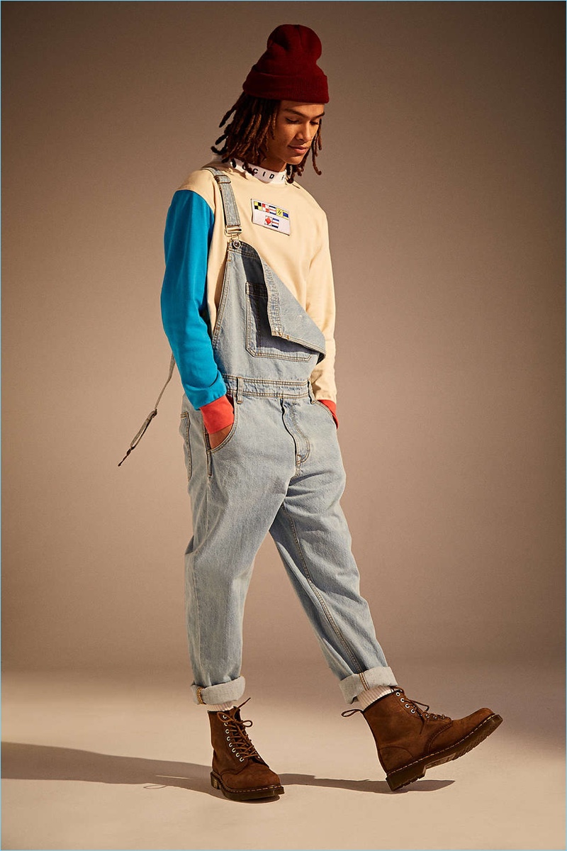 Take a style note from Urban Outfitters and wear BDG's light stone wash overalls with one strap undone.