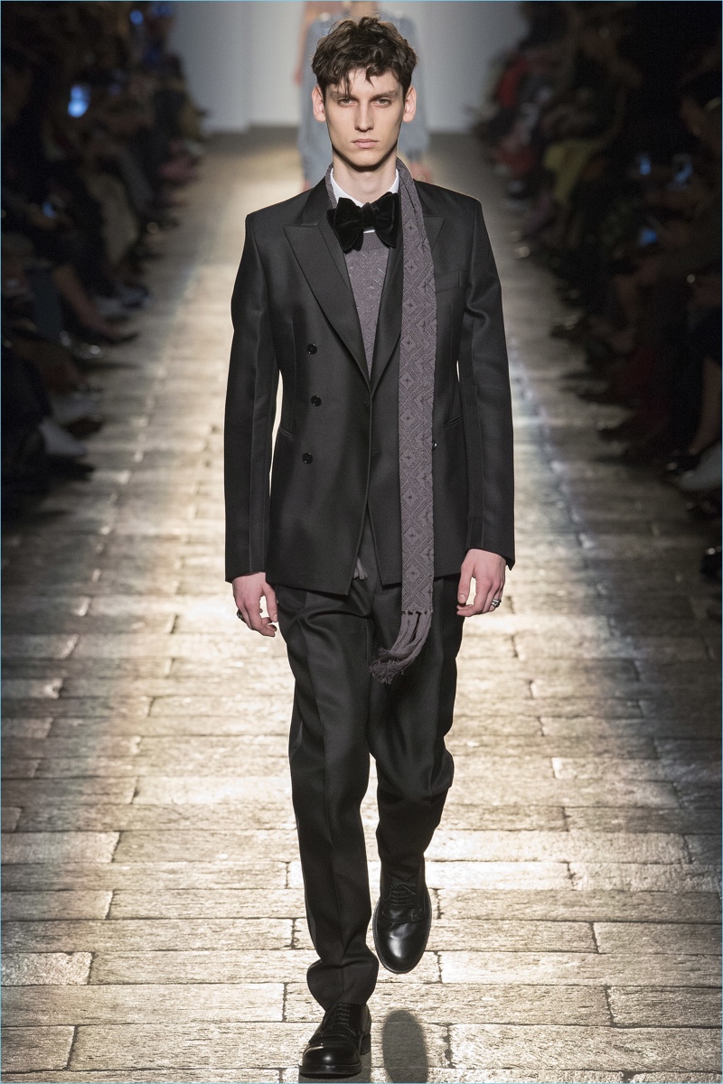 Bottega Veneta goes formal for fall-winter 2017 with double-breasted suits and oversized bow-ties.