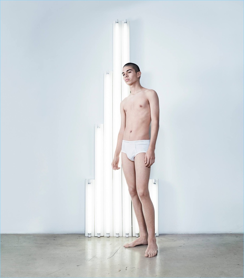 Modeling underwear, Ernesto Cervantes stands in front of Dan Flavin's Untitled (Monument for V. Tatlin) for Calvin Klein's American Classics campaign.