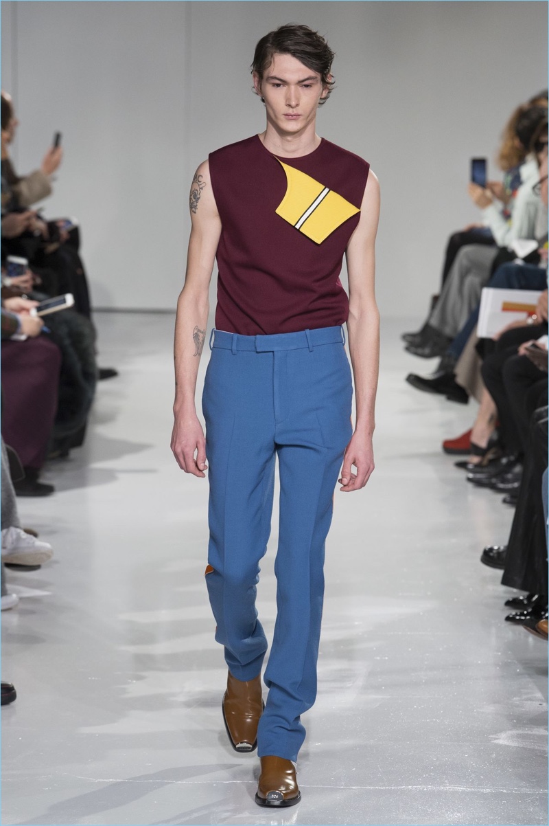 Raf Simons embraces clean minimal lines for his Calvin Klein Collection men's debut.