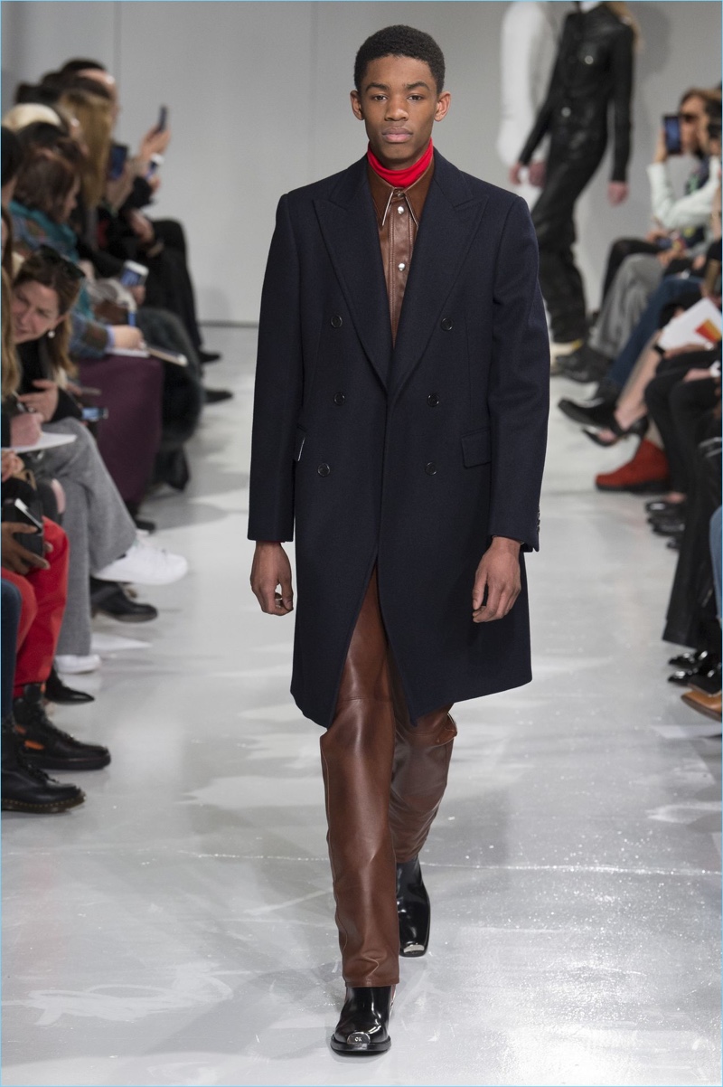 Leather and tailoring come together for a standout fall-winter 2017 look by Calvin Klein Collection.