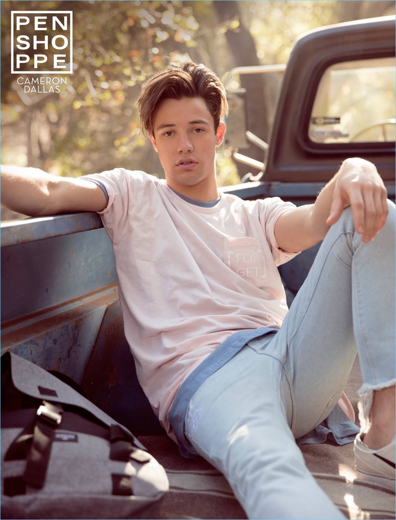 Relaxing in the back of a pickup truck, Cameron Dallas appears in Penshoppe's spring-summer 2017 campaign.