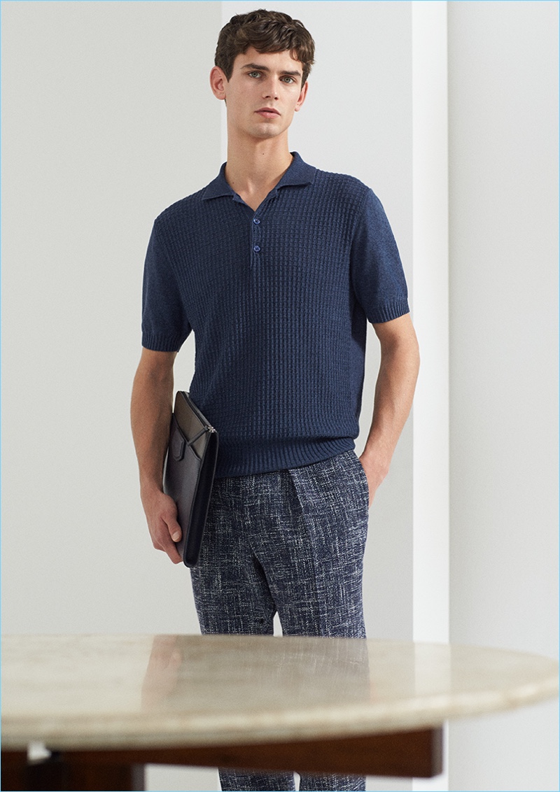 Arthur Gosse wears a textured polo with printed trousers from Canali's spring-summer 2017 campaign.