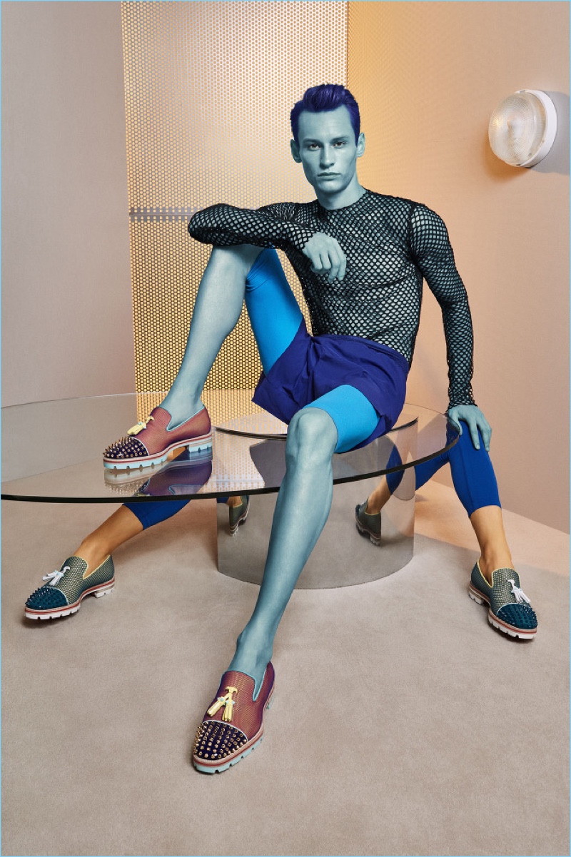 Model Adrien Volkov rocks studded loafers for Christian Louboutin's spring-summer 2017 men's campaign.