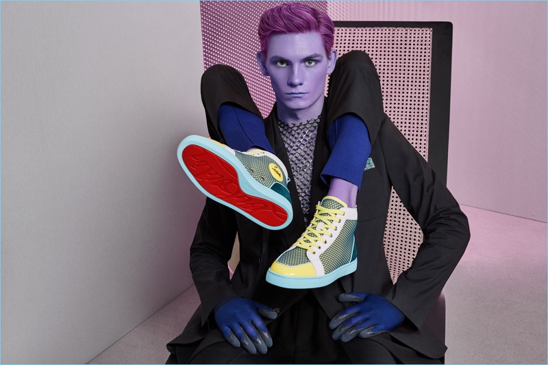Paul Lemaire sports hi-top sneakers for Christian Louboutin's spring-summer 2017 campaign.