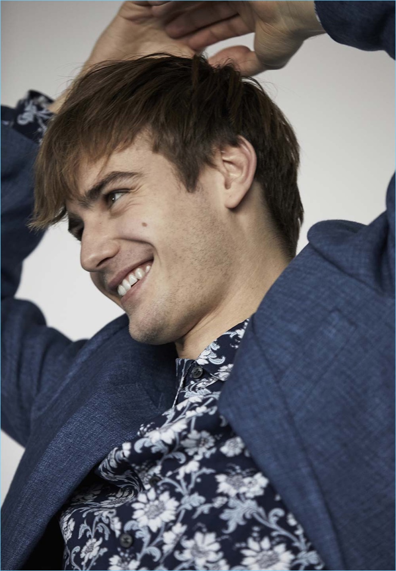 British model Ben Allen delivers a charming smile for Club Monaco's spring-summer 2017 campaign.