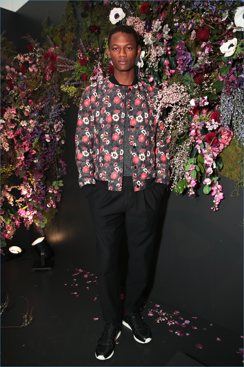 The bomber jacket receives a spring update with a floral print from Club Monaco.