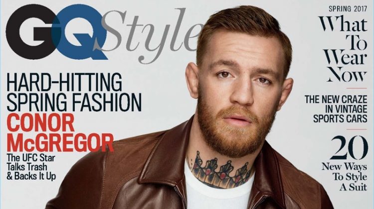 Conor McGregor covers the spring 2017 issue of GQ Style. McGregor sports a brown leather jacket by Neil Barrett with a shirt and belt by Dolce & Gabbana. The UFC star also wears Levi's jeans and a Breguet watch.