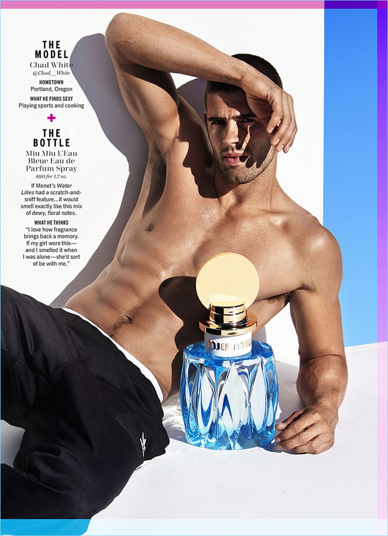 Chad White goes shirtless with an oversized bottle of Miu Miu L'Eau Bleue.