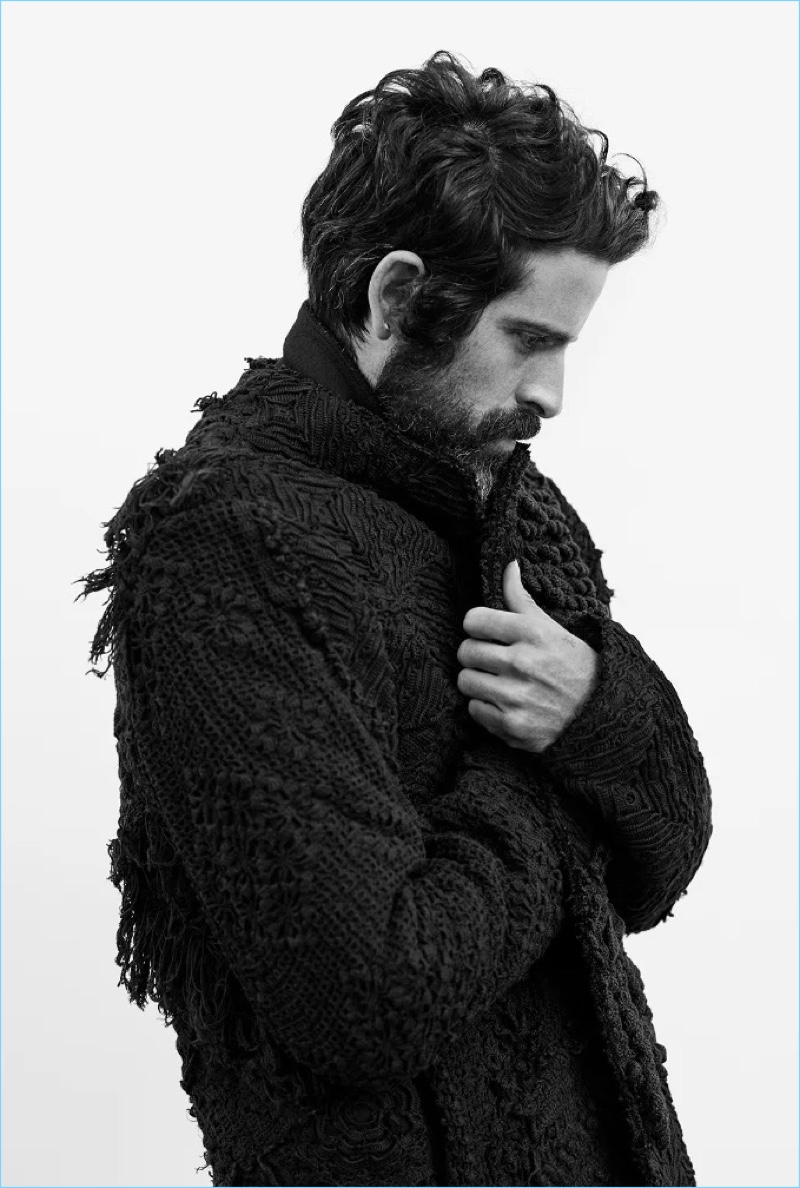 Devendra Banhart wears a crocheted cotton coat from By Walid.