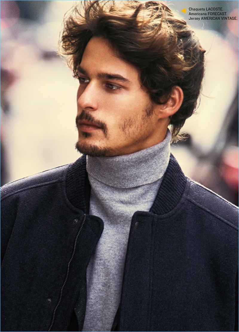 Model Edu Roman wears a Lacoste bomber jacket with an American Vintage turtleneck.