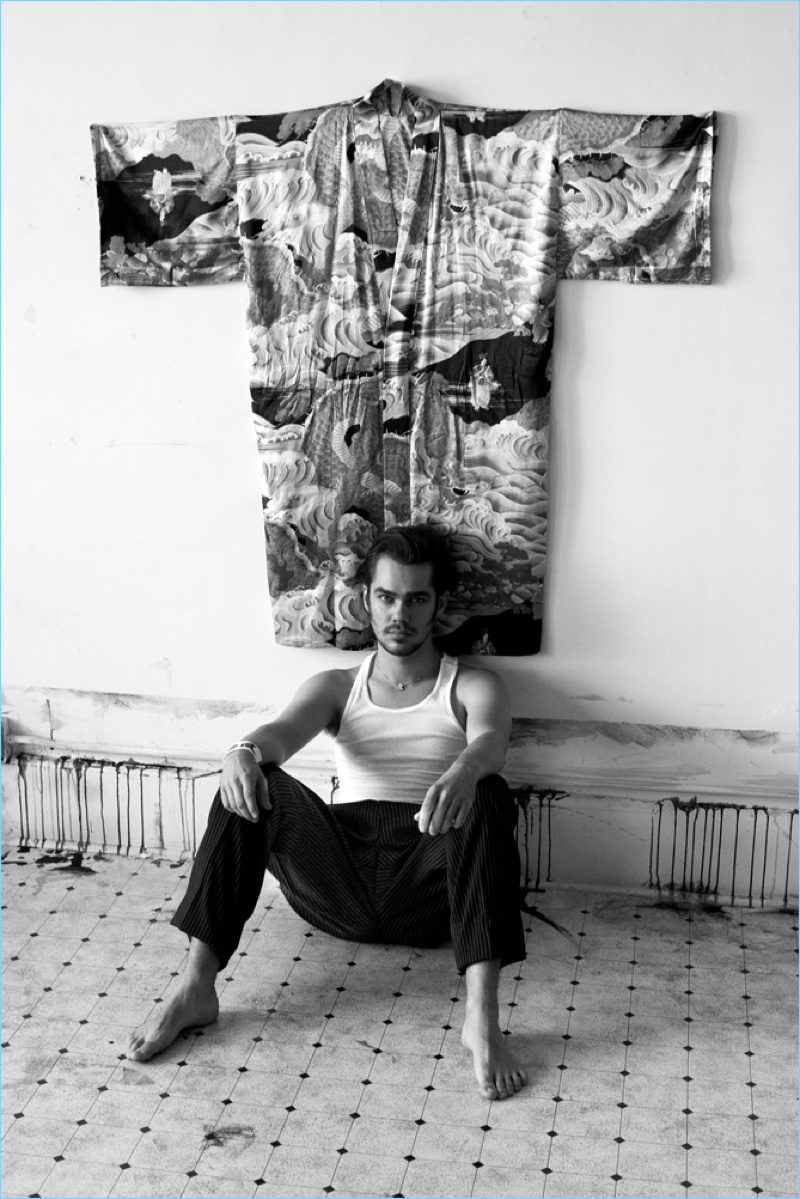 Ellar Coltrane wears a POLO Ralph Lauren tank with Lanvin trousers.