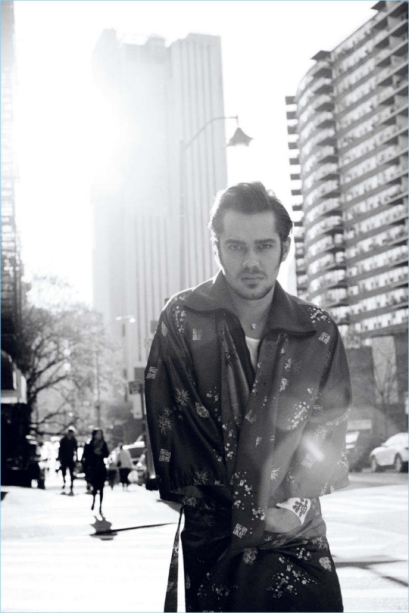 Taking to the streets of New York, Ellar Coltrane wears a Coach jacket with a Gucci kimono and Lemaire trousers.