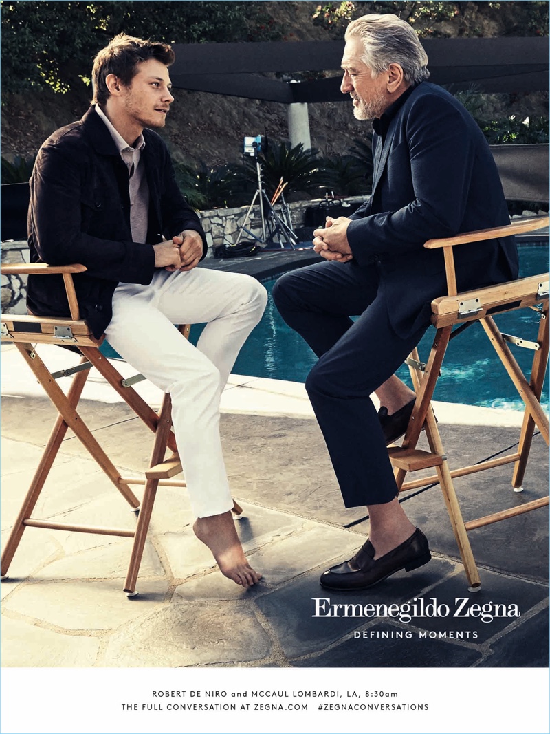 Actors McCaul Lombardi and Robert De Niro enjoy a chat poolside for Ermenegildo Zegna's Defining Moments campaign.