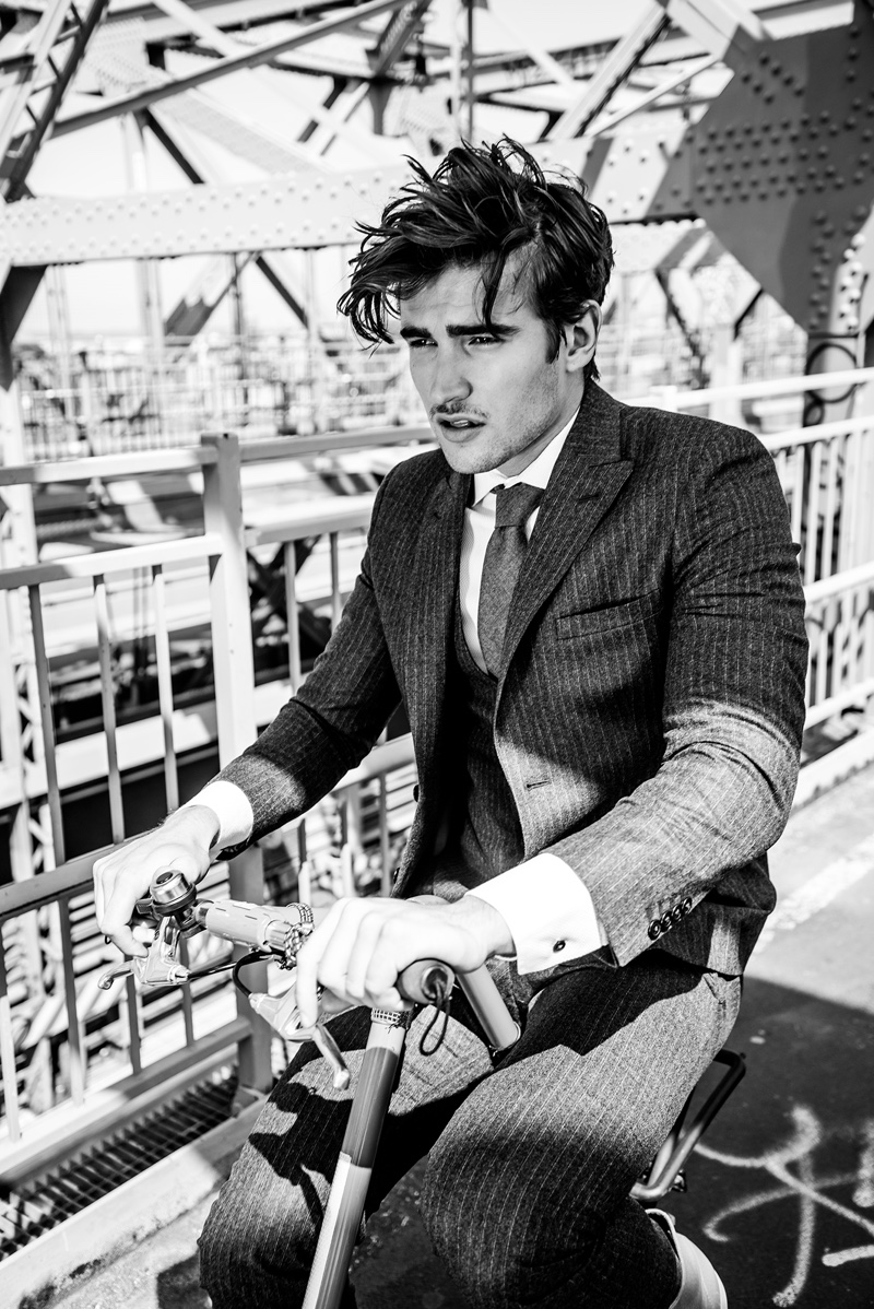 Going for a ride, Jack Tyerman sports a three-piece pinstripe suit by Stephen F.