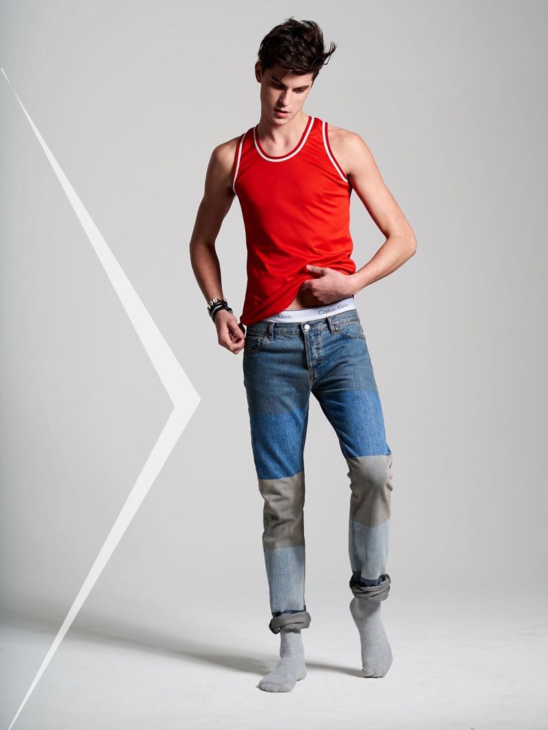 Joshua wears vintage 70s tank stylist's own, denim jeans Kenzo, bracelets 81stgeneration, and socks American Apparel.