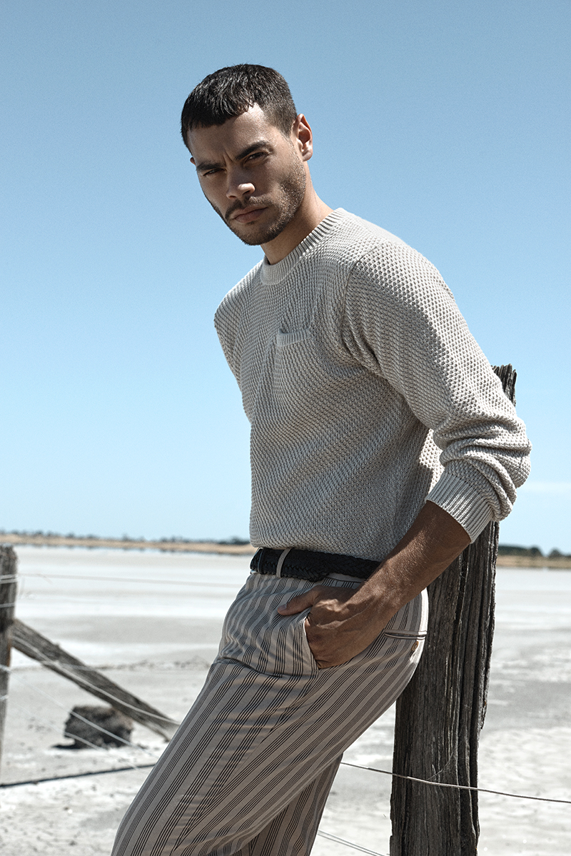 Nathan wears sweater Patrik Ervell, pants Dolce & Gabbana, and belt Ralph Lauren.