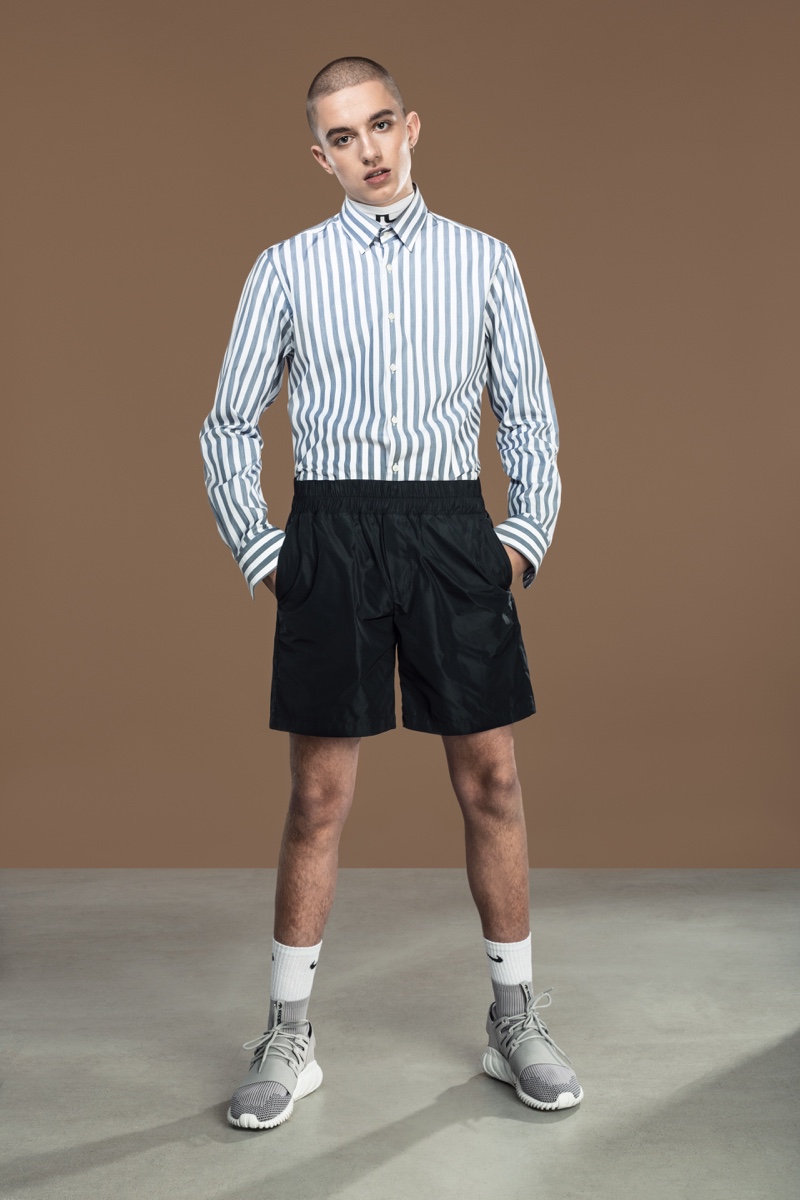 Vilhelm wears shorts Weekday, socks Nike, sneakers Adidas, striped shirt and turtleneck J.Lindeberg.