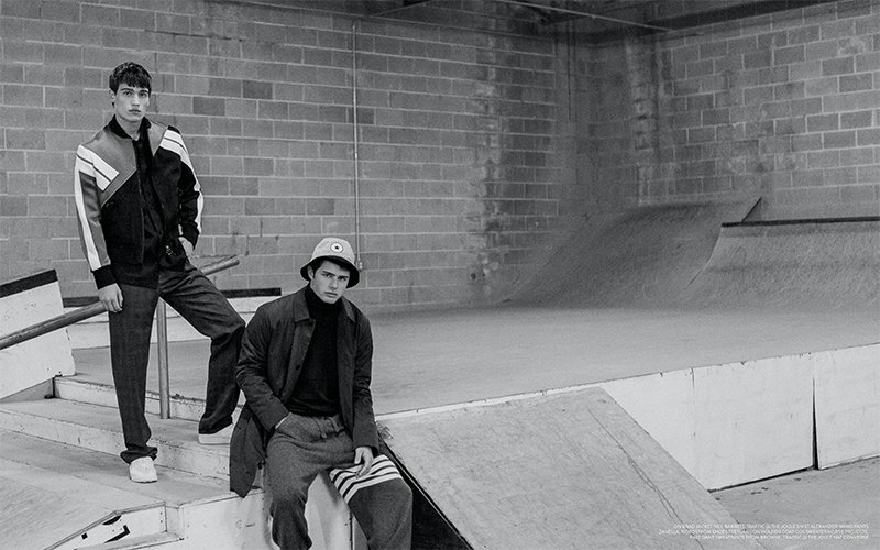 Left to Right: Brad wears jacket Neil Barrett from Traffic at The Joule, shirt Alexander Wang, pants Zanella from Nordstrom and shoes Tretorn. Holden wears coat COS, sweater Norse Projects from East Dane, sweatpants Thom Browne from Traffic at The Joule, and hat Converse.