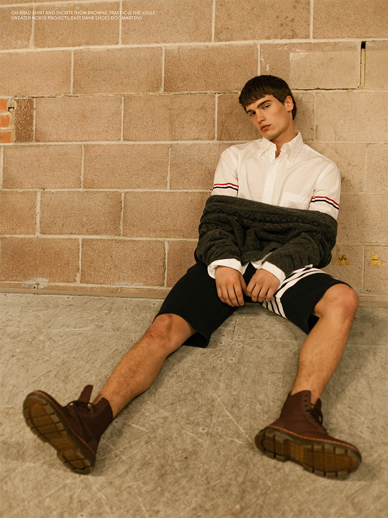 Brad wears shirt and shorts Thom Browne from Traffic at The Joule, sweater Norse Projects from East Dane, and shoes Dr Martens.