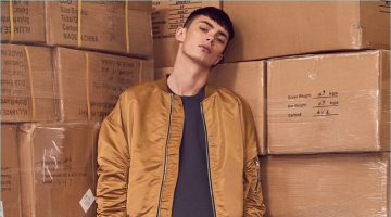 The High Street Edit: Forward Spotlights Fear of God, John Elliott + More Model Simon Kotyk sports a typical streetwear look with a Fear of God bomber jacket, sweatshirt, and nubuck leather military sneakers. Simon also wears Mr. Completely denim jeans.