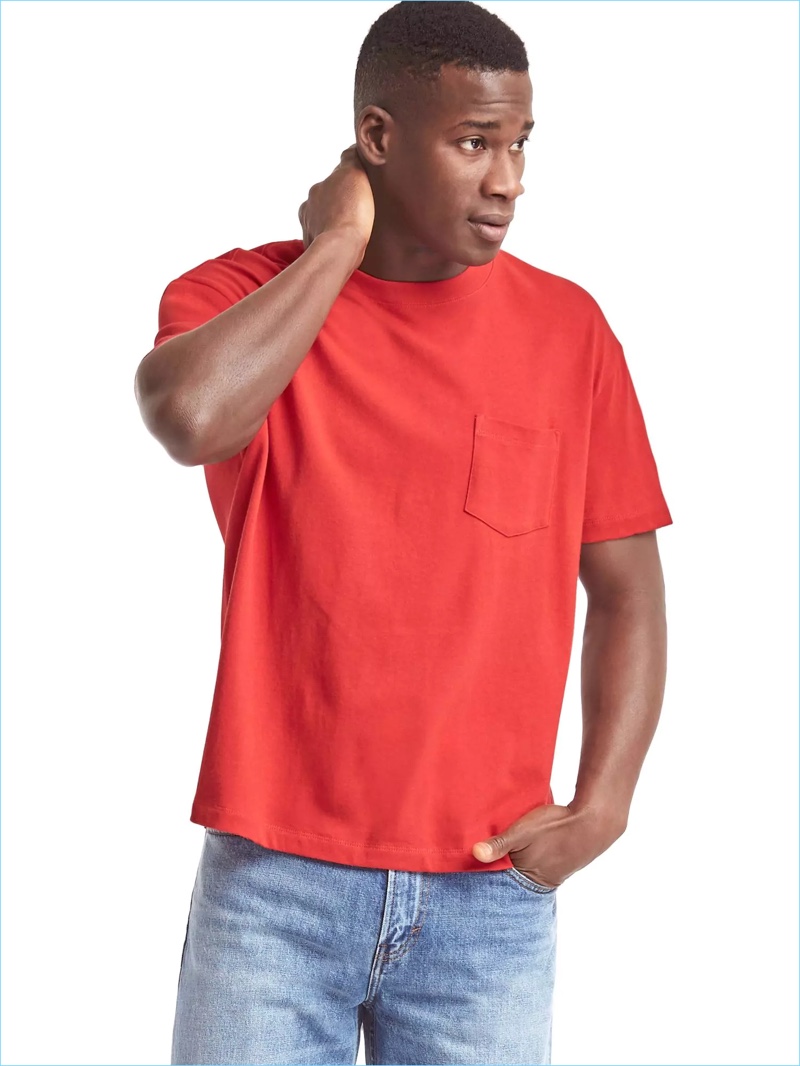 Model David Agbodji goes casual in an original red pocket tee from Gap's Archive Re-Issue collection.