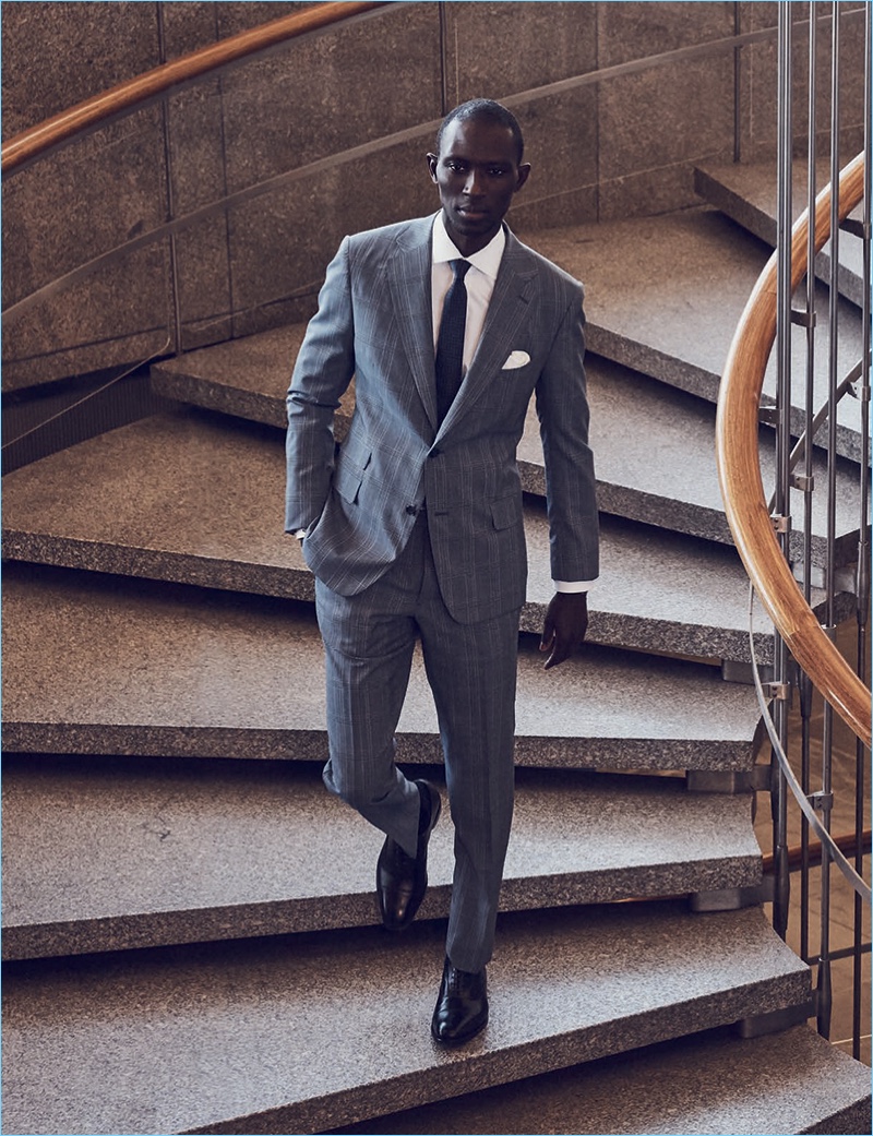 Armando Cabral steals the scene in a sharp suit by J.Hilburn.