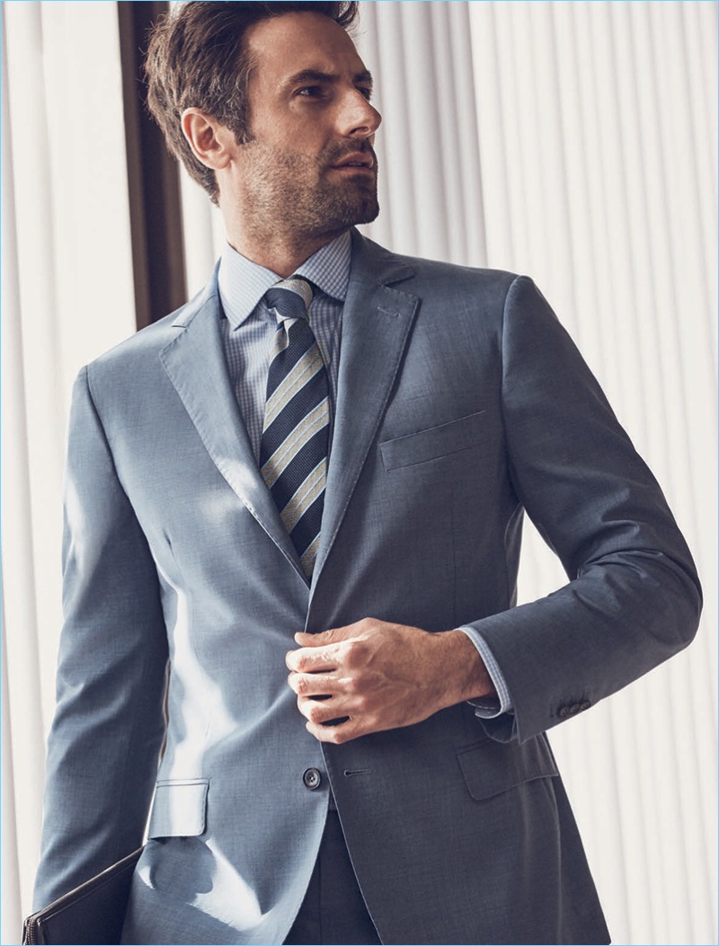 Cutting a sharp figure, Josh Wald wears J.Hilburn suiting.