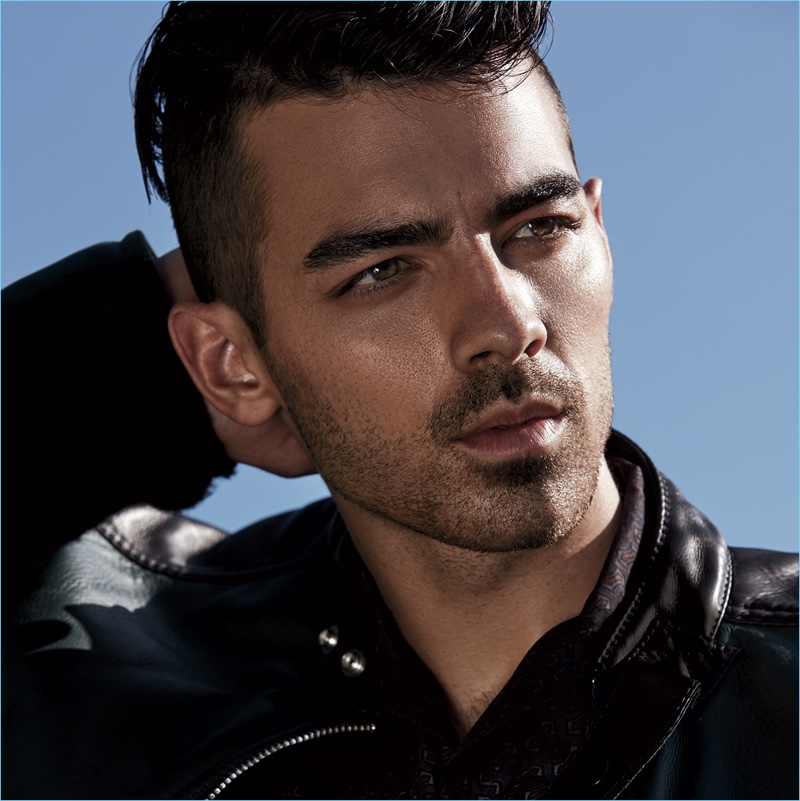 Singer Joe Jonas wears a Fendi jacket with a Lanvin shirt.