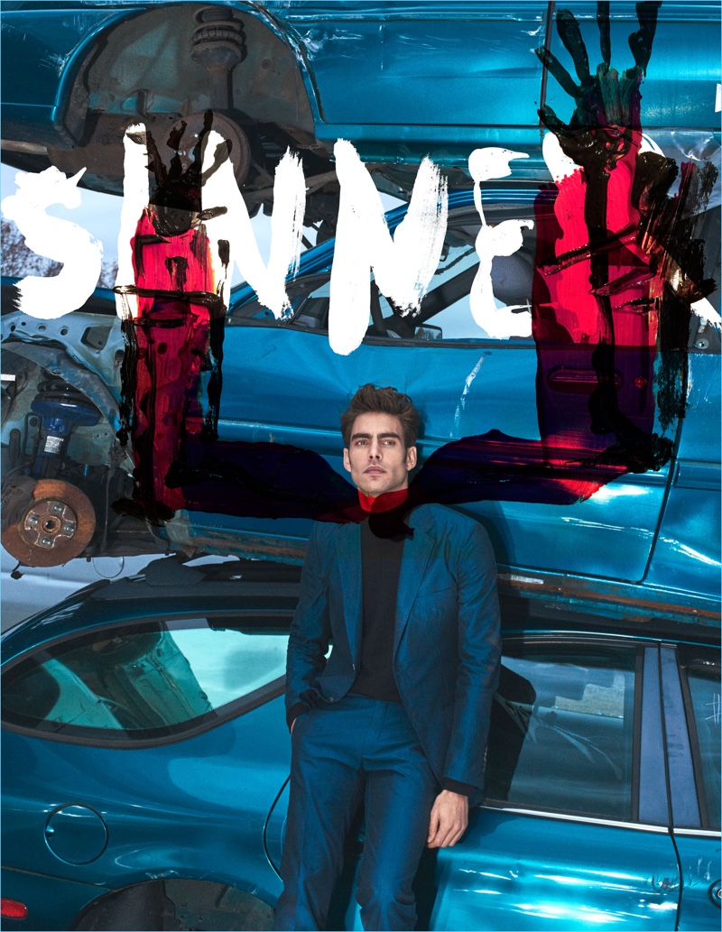 Embracing blue, Jon Kortajarena wears a Hermes suit with an Issey Miyake turtleneck.