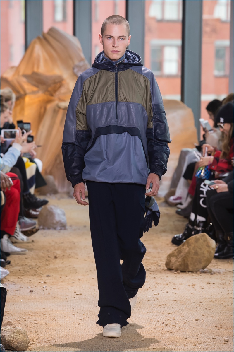 Lacoste embraces a sporty relaxed silhouette for its fall-winter 2017 men's collection. » Lacoste Brings the 90s Back with Aviator Inspired Fall '17 Collection Lacoste embraces a sporty relaxed silhouette for its fall-winter 2017 men's collection.