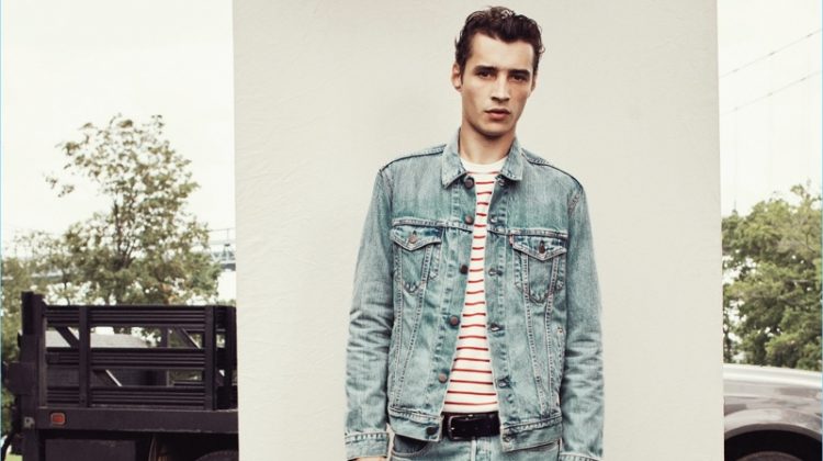 Adrien Sahores models Levi's 501 skinny jeans in the brand's Hillman wash.