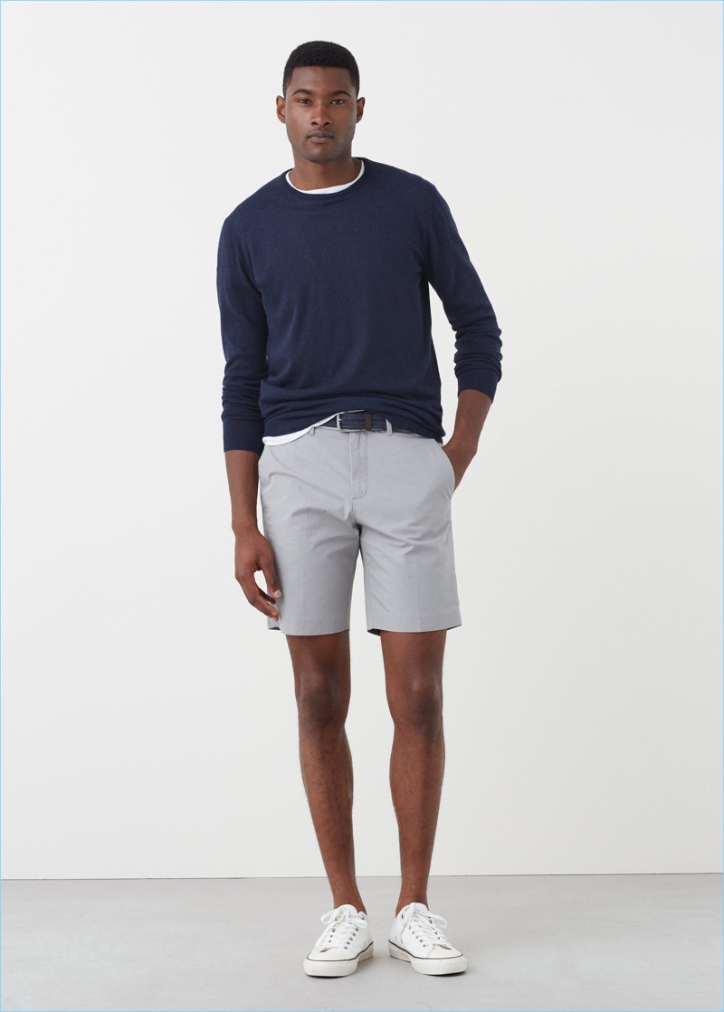 Mango Man makes a smart style suggestion, pairing its grey Bermuda shorts with a navy pullover.