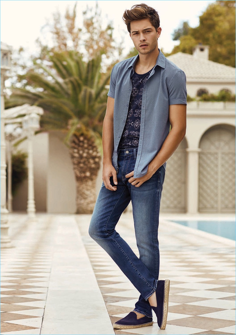 Francisco Lachowski wears Mavi's Jake regular-rise slim leg denim jeans.