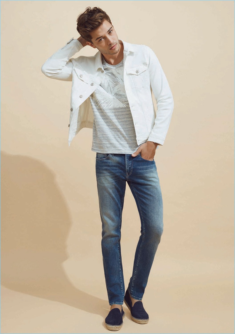 Brazilian model Francisco Lachowski wears Mavi's Frank white denim jacket with its Jake regular-rise slim leg jeans.