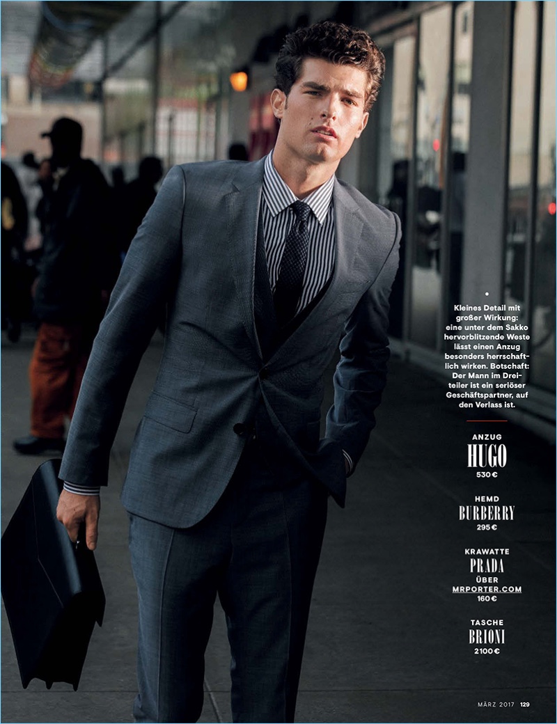 Embracing a business look, Paolo Anchisi wears a suit by HUGO Hugo Boss.