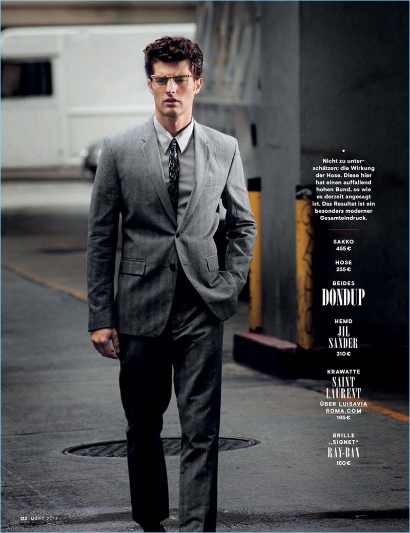 Tapping into a smart aesthetic, Paolo Anchisi sports a grey Dondup suit.