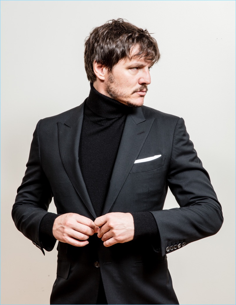 Michaela Dosamantes outfits Pedro Pascal in a tailored suit and turtleneck for Solar magazine.