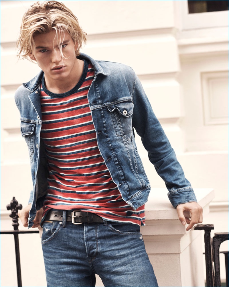 Jordan Barrett rocks jeans and a denim jacket with a striped tee for Pepe Jeans' spring-summer 2017 campaign.