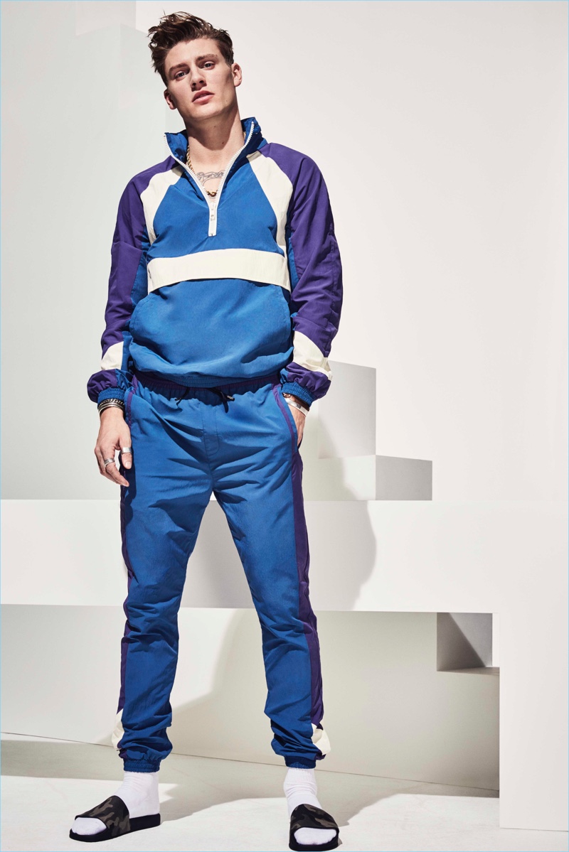 Mikkel Jensen rocks a color blocked jogging suit from River Island's high summer 2017 collection.