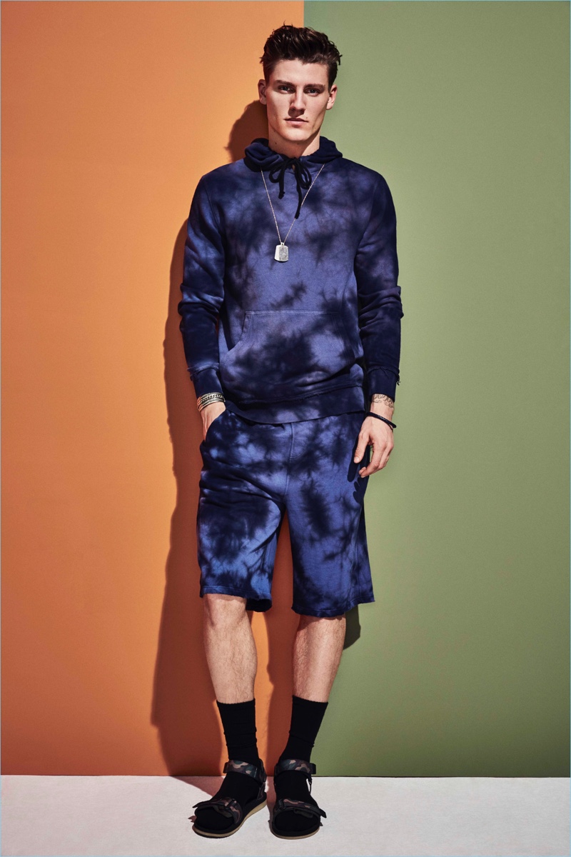 River Island embraces a graphic tie-dye effect for a matching hoodie and shorts set.