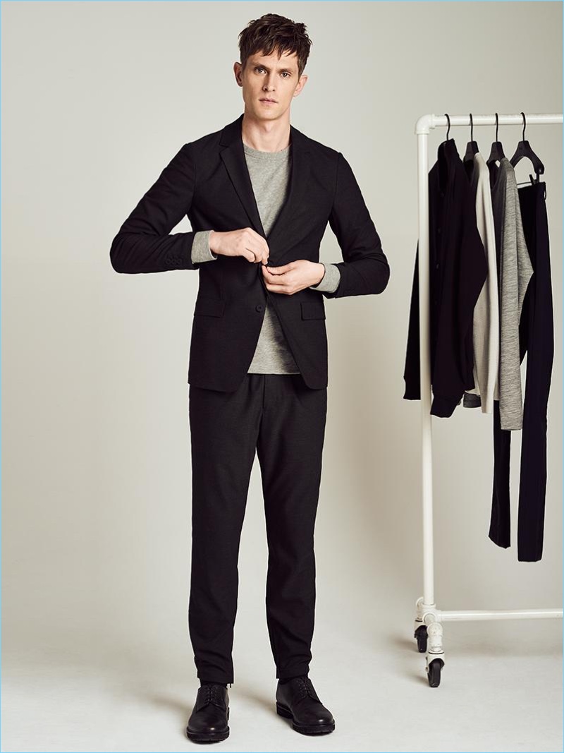 Theory's tech knit jacket is front and center as Mathias Lauridsen wears it with a sweatshirt and jogger pants.