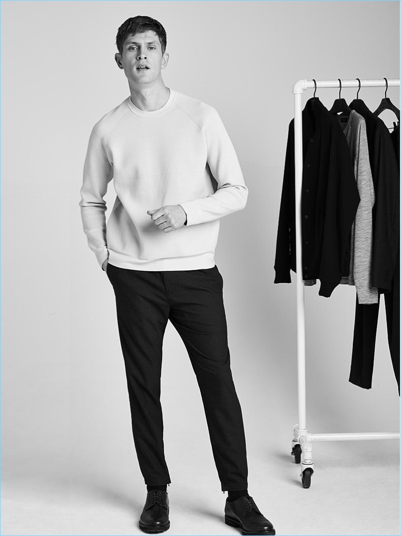 Mathias Lauridsen plays it casual in a tech knit crewneck and jogger pants from Theory.