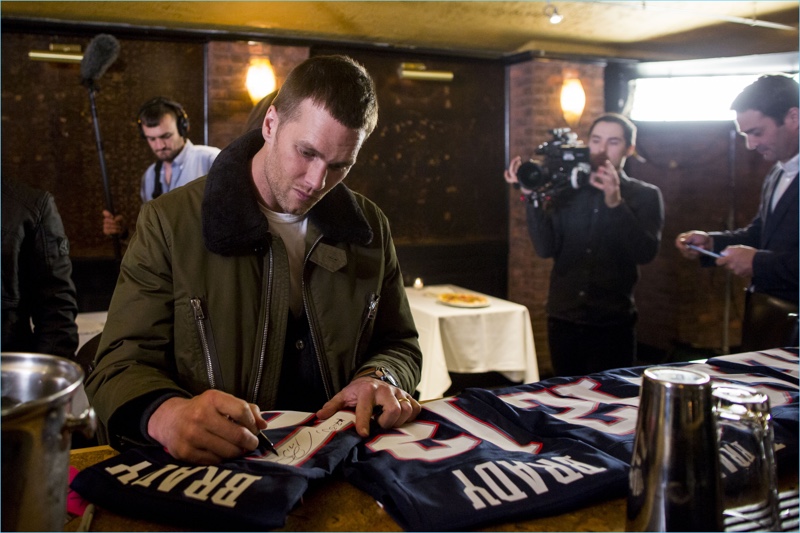 Tom Brady autographs jerseys at 'A Triumphant Celebration with Living Legend, Tom Brady' on February 8, 2017 in Boston, Massachusetts.