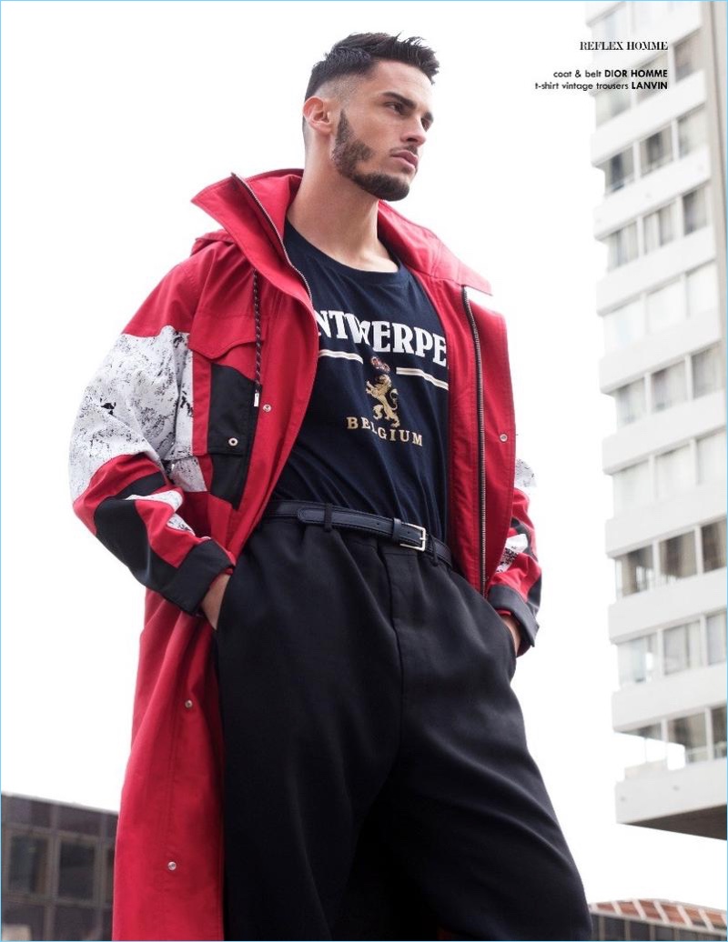 Embracing a sporty look, Baptiste Giabiconi wears a vintage t-shirt with Lanvin trousers. The French model also sports a Dior Homme coat and belt.