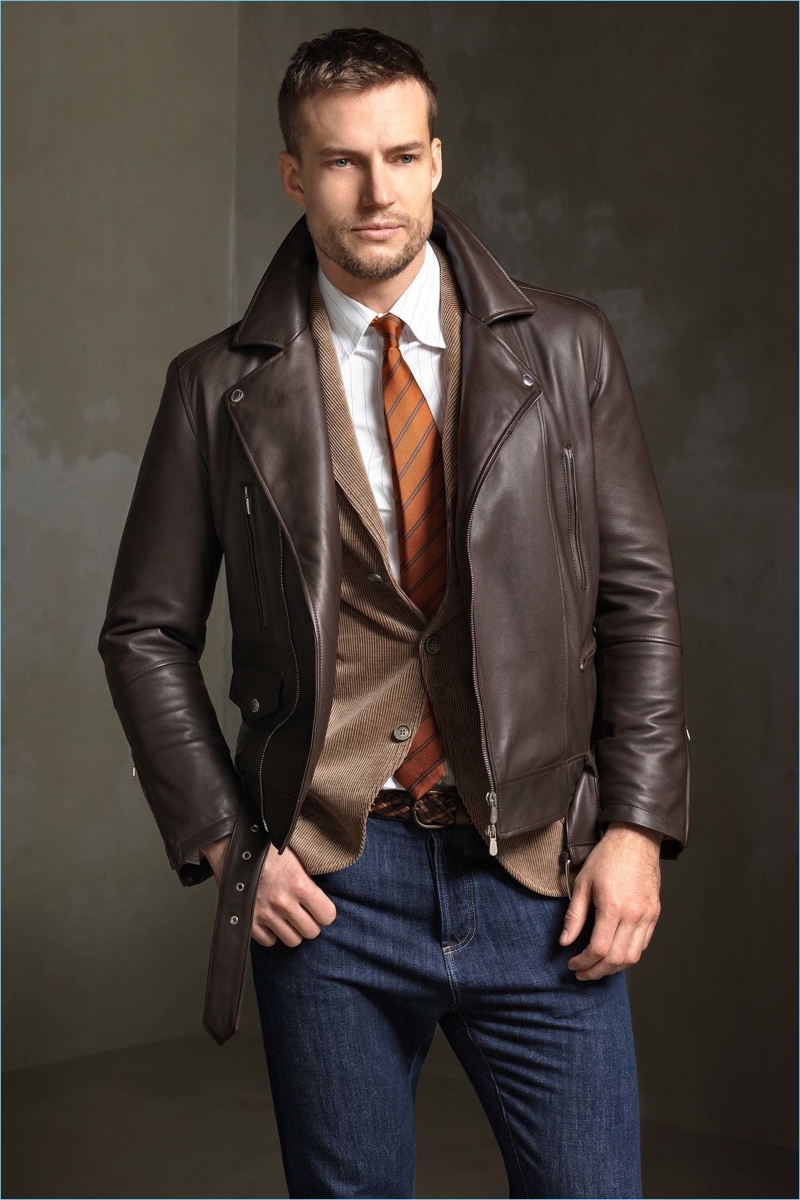 Preppy style meets a cool aesthetic with smart tailoring, jeans, and a brown leather jacket from Brunello Cucinelli.