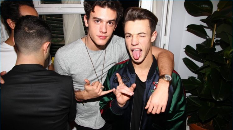 Sticking out his tongue, Cameron Dallas poses for a picture with Xavier Serrano.