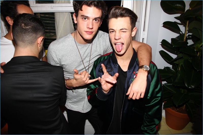 Sticking out his tongue, Cameron Dallas poses for a picture with Xavier Serrano.