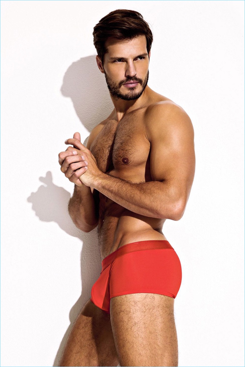 Model Diego Miguel makes a bold underwear statement in a red style from Charlie by Matthew Zink.